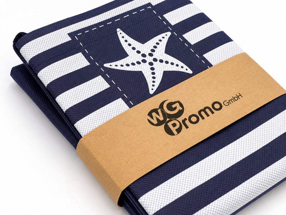 Navy and white striped textile with a starfish motif and a kraft paper band