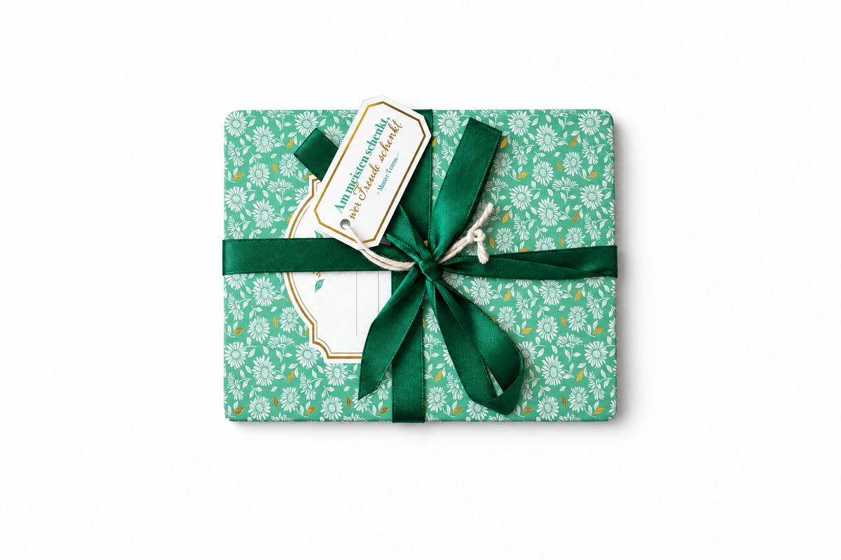 A gift-wrapped parcel with a ribbon and tag